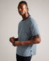 CHETEL-Tops-Bring your look to life with CHETEL. Boasting a bold geometric print and classically comfortable silhouette, this tee will be your partner in style any day of the week. T-shirt Geometric print Short sleeves Crew neck Pure cotton Ty is 6'1" / 1.86m and wears Light Blue in a Ted size 3- Ted Baker Romania